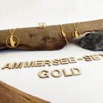 Set "Ois was ma ham" in gold